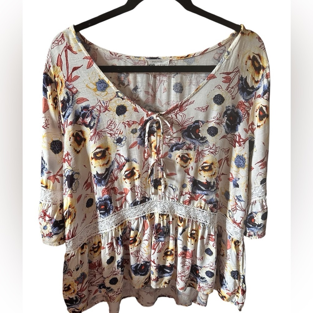 Maurice’s 0X cream pansy blouse with blue & yellow flowers. Cream lace detail.